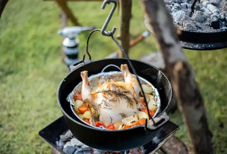 Cooking over campfire using dutch oven